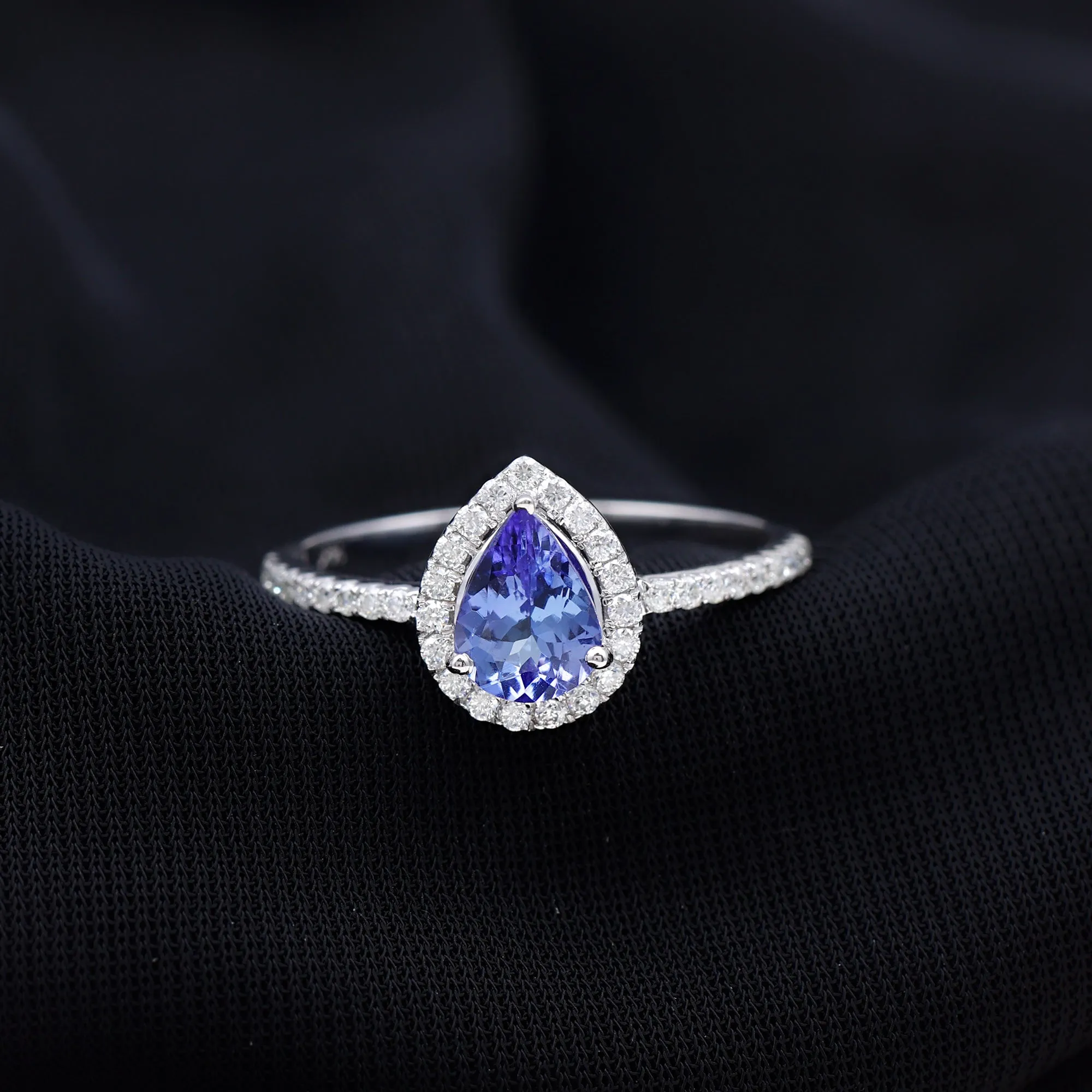 Pear Shaped Tanzanite Halo Engagement Ring with Diamond