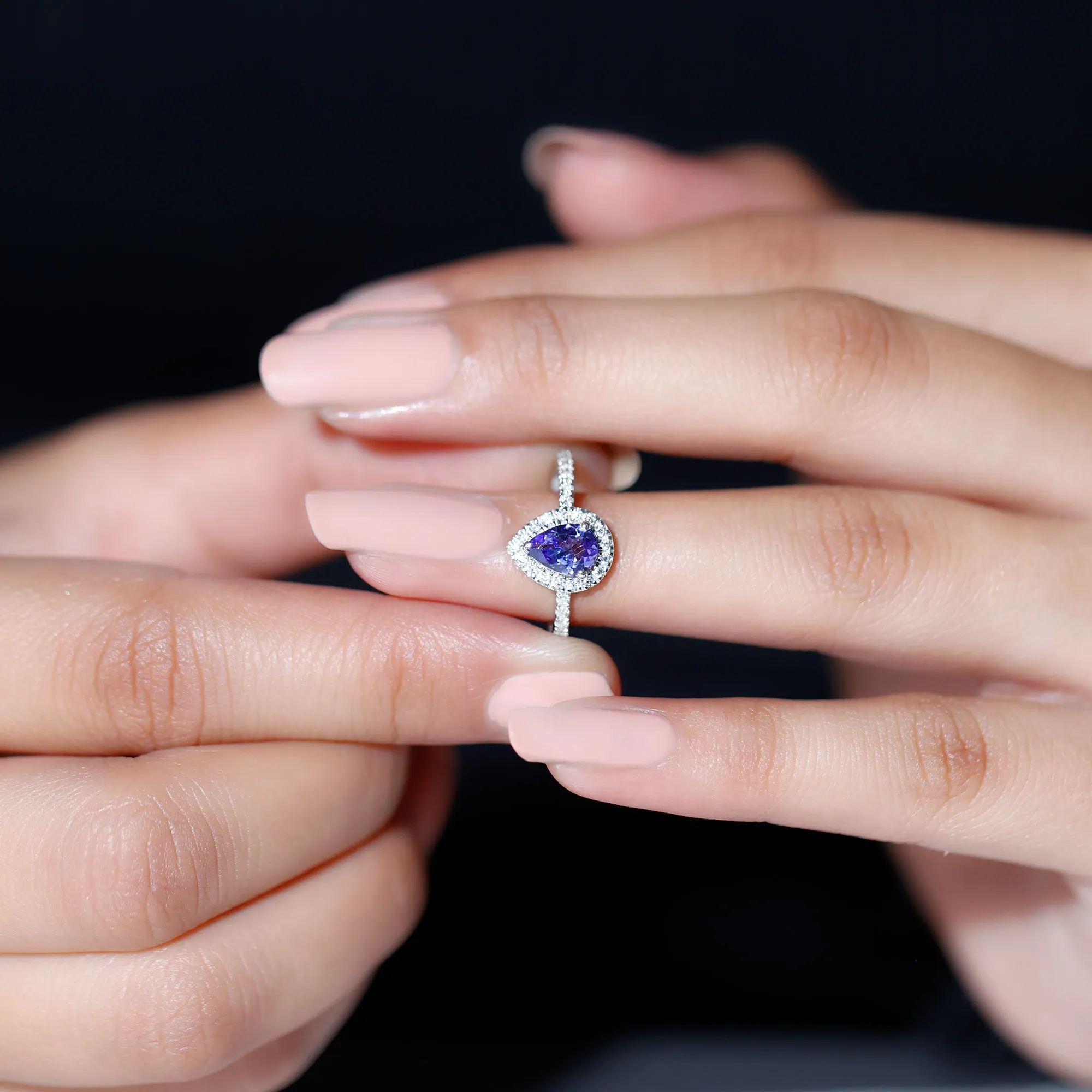 Pear Shaped Tanzanite Halo Engagement Ring with Diamond