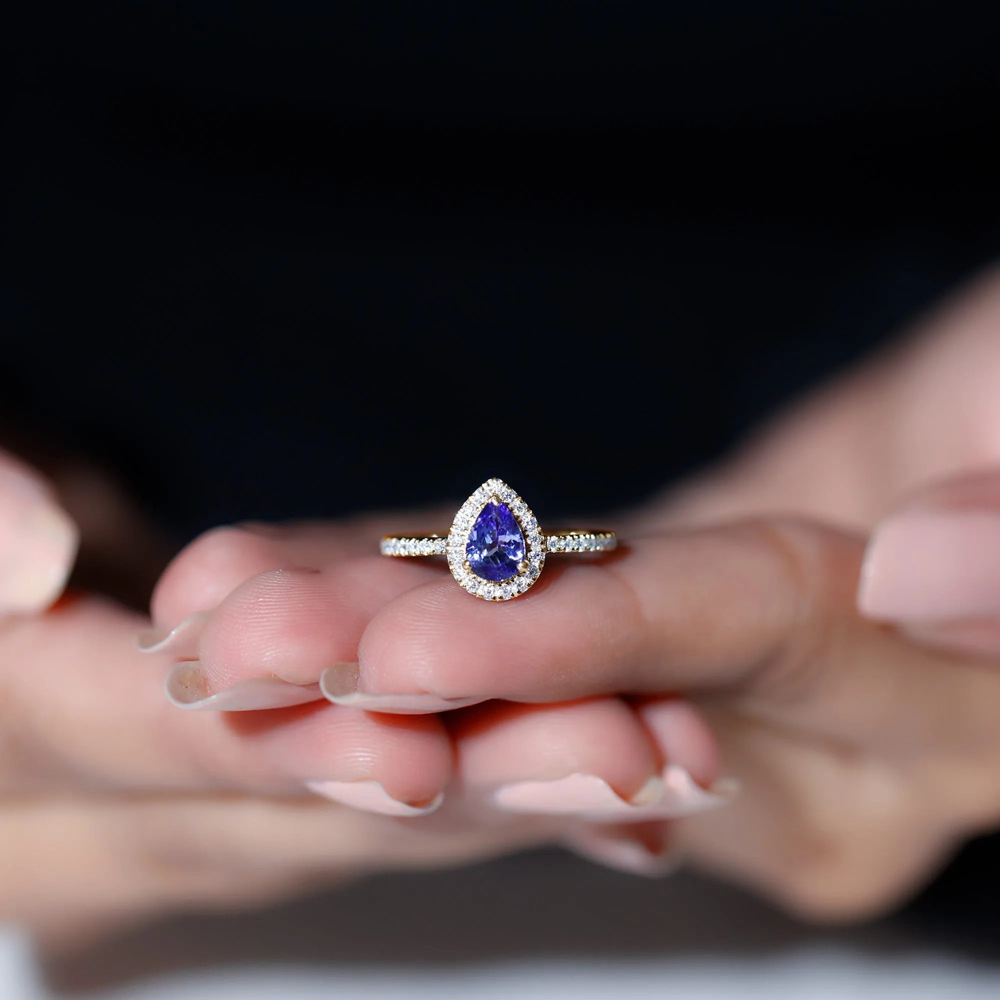 Pear Shaped Tanzanite Halo Engagement Ring with Diamond